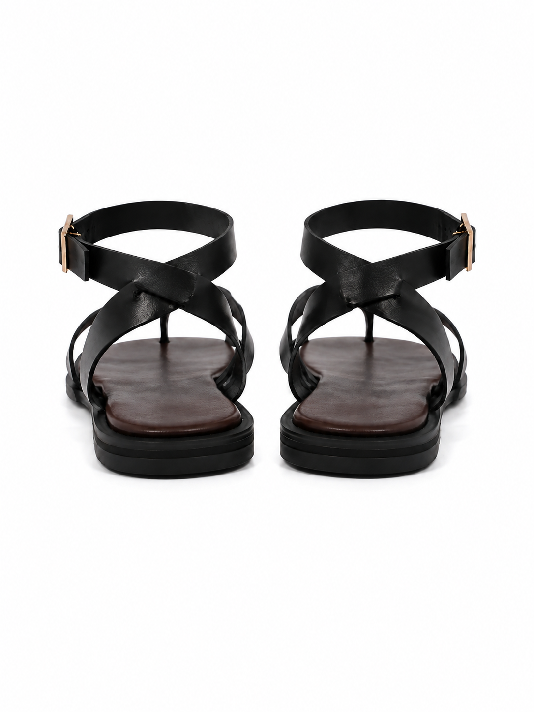 Sandales plates noires à brides croisées & bijou doré
