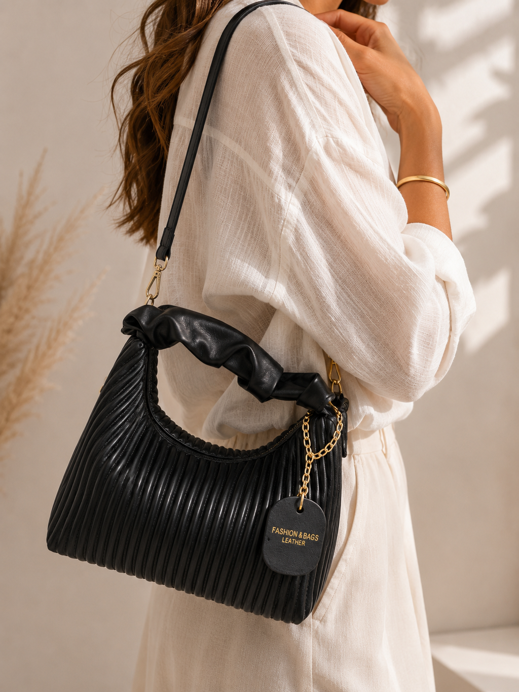 Petit sac noir plissé – Porté main & bandoulière